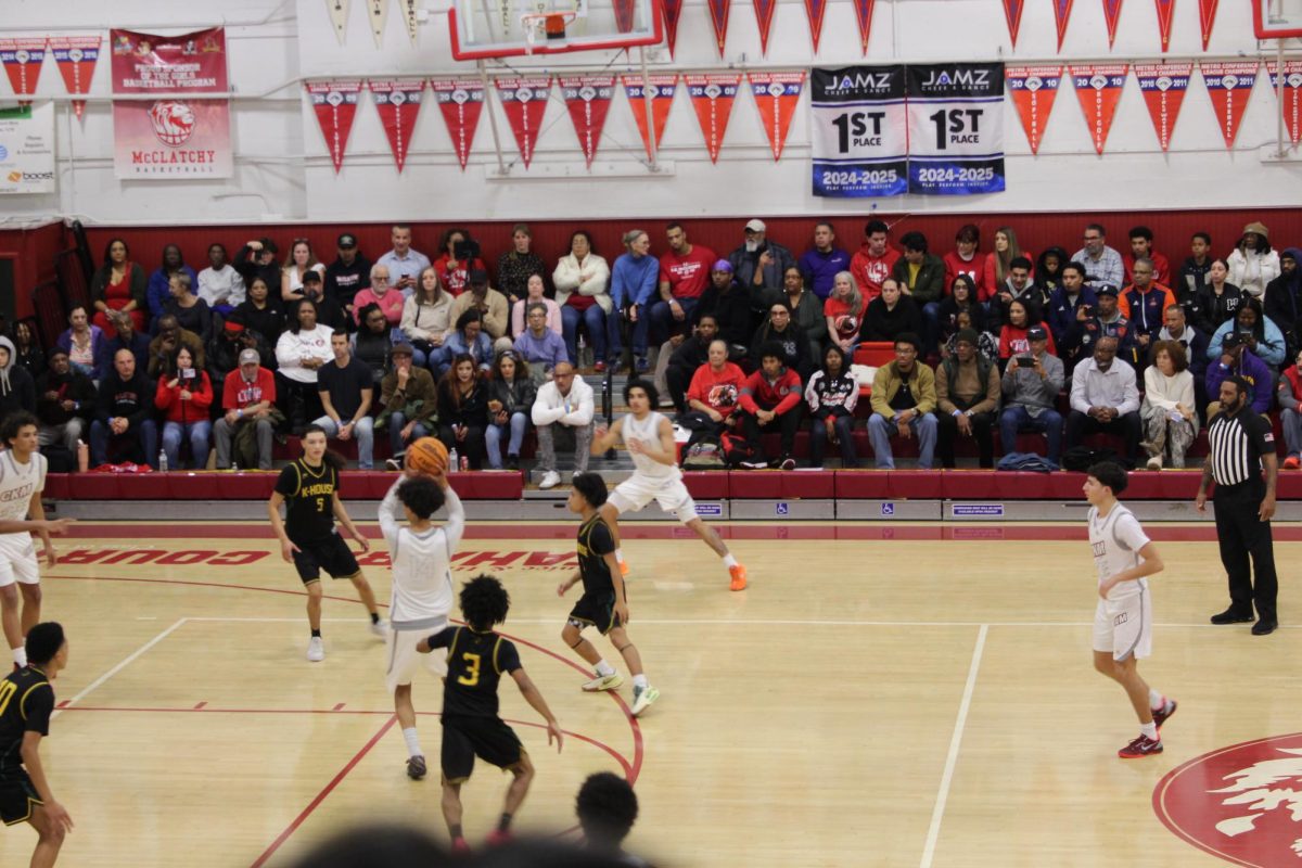 Kennedy players surrounding a McClathy player as he tries to pass the ball