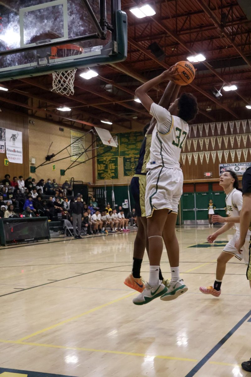 On February 11 in the Kennedy Gym, Jordan Pitts got the rebound and tried to make the 3 footer but was blocked. Jordan finished the game with 8 points.