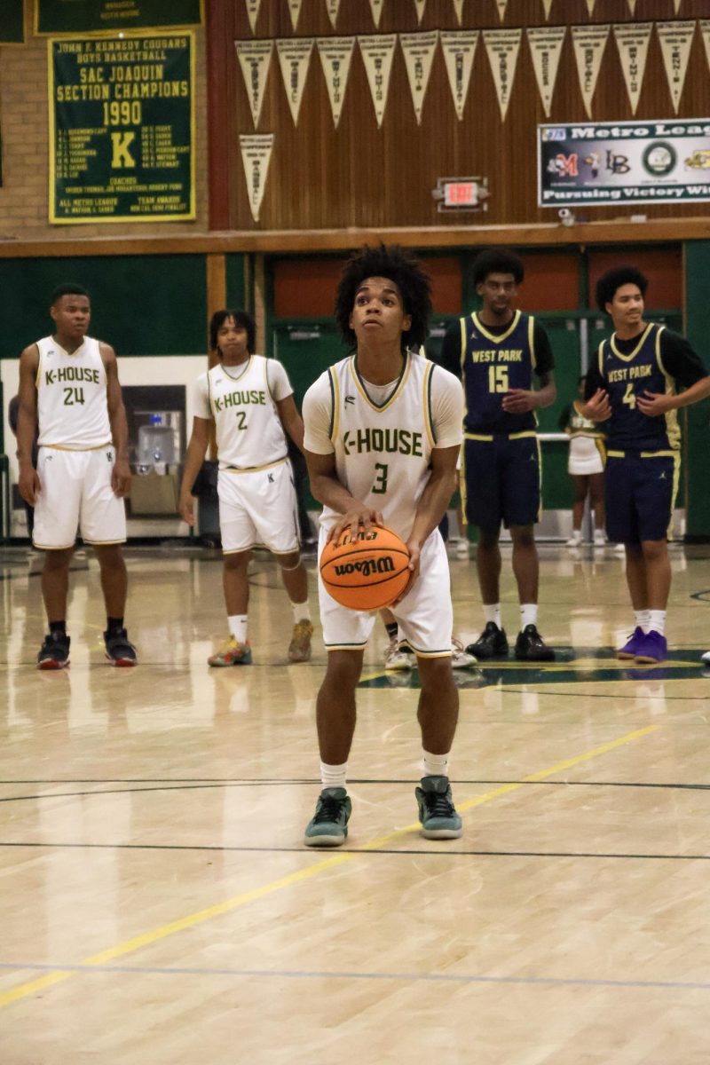On Feburary 11 in the Kennedy gym, Marcus Menefee is at the freethrow line about to take the shot. The final score was 71-59.