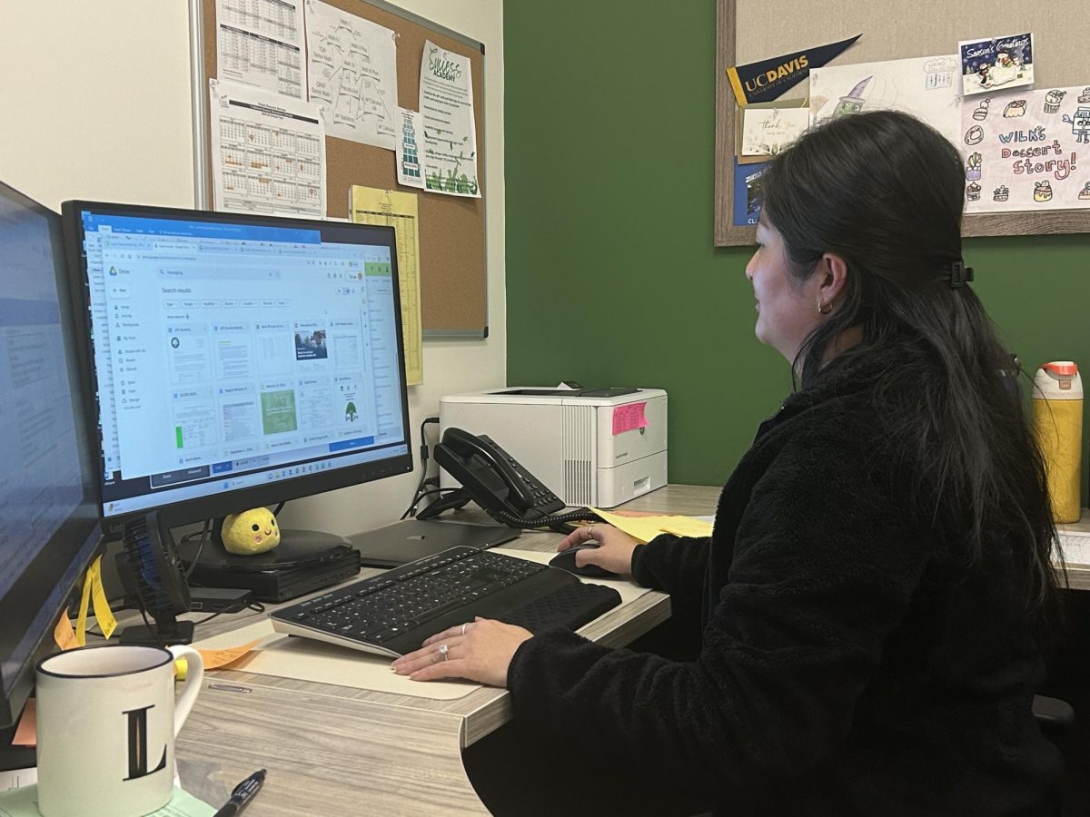 Counselor Ms.Nguyen, working hard to change her students' schedules on Tuesday Feb 3. She’s looking to see which classes are best for her students.  
