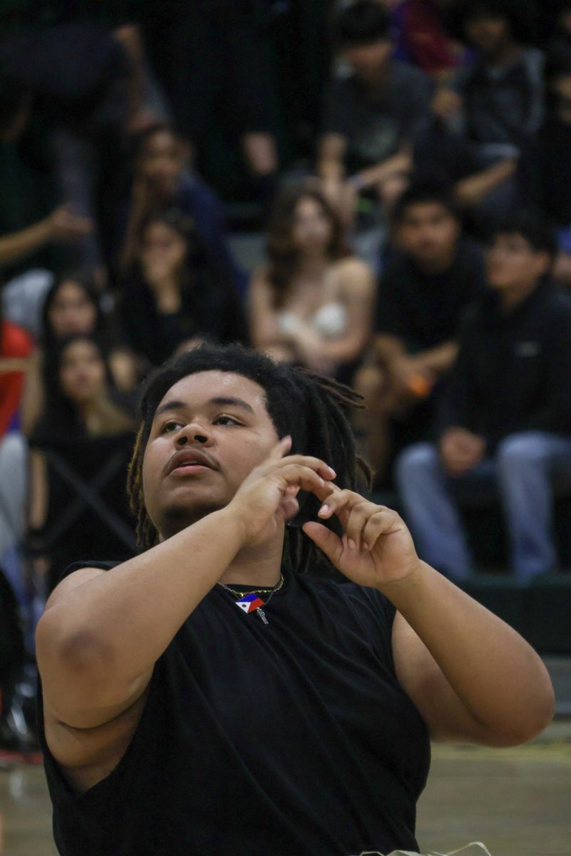 Jo'Cyah Marilao during his performance with the Pacific Islander club at Kennedy's multicultural rally on Friday March 20. The agenda of the dance was to show off Pacific Islander pride.