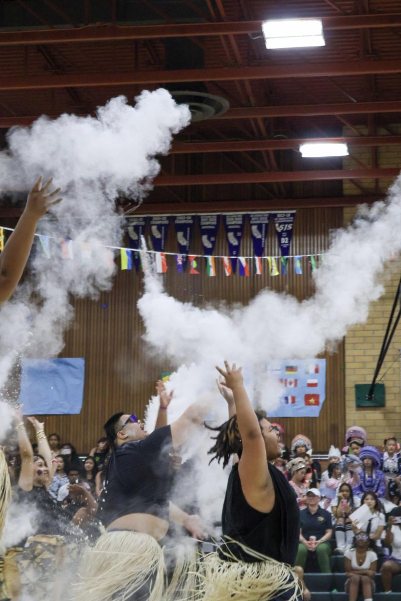 Pacific Islander Club throwing baby powder after their performance on Friday March 20 at the Kennedy gym. It left a memorable performance for those of Pacific Islander descent.
