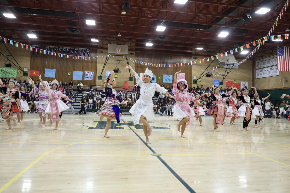 Hmong club performing at the Multicultural rally on Friday March 20 at the Kennedy gym. The dance was one of the many cultural dances at the rally.