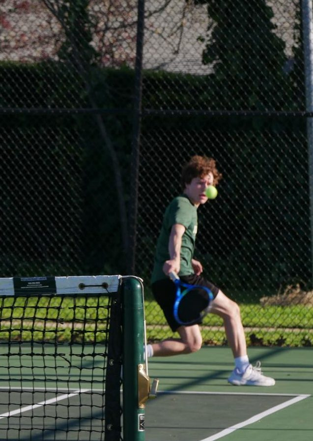 Hashimoto taking his shot during rally on March 5. A rally in tennis a sequence where players alternate shots until a point is scored.
