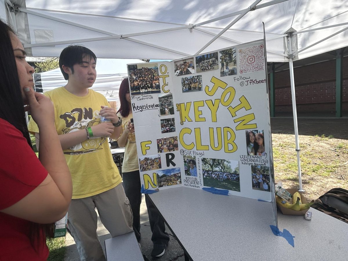 On March 18 in the quad, Sarah Karshiboyev seemed interested in the presentation by Brayden Lau about joining Key Club.