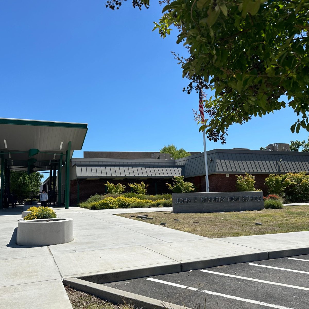 The front of the school at John F. Kennedy High School on May 15. Students are leaving campus grounds to go home.